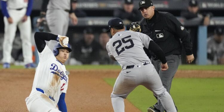 Shohei Ohtani slides