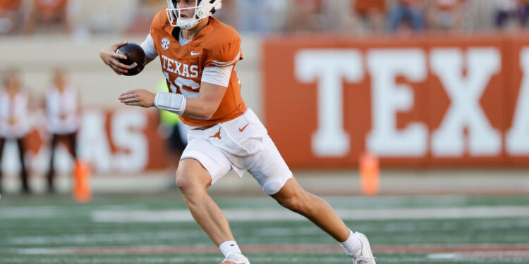 AUSTIN, TEXAS - SEPTEMBER 28: Arch Manning #16 of the Texas Longhorns scrambles in the second half against the Mississippi State Bulldogs at Darrell K Royal-Texas Memorial Stadium on September 28, 2024 in Austin, Texas. (Photo by Tim Warner/Getty Images)