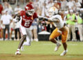 Arkansas wide receiver Andrew Armstrong (2) tries to get past Tennessee linebacker Keenan Pili (11) during the first half of an NCAA college football game, Saturday, Oct. 5, 2024, in Fayetteville, Ark. (AP Photo/Michael Woods)