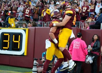 Ben Sinnott celebrates a TD pass