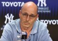 Brian Cashman talks to press