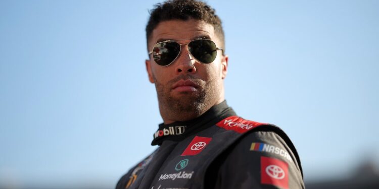 Bubba Wallace looks on during qualifying for the NASCAR Cup Series Bass Pro Shops Night Race at Bristol Motor Speedway on September 20, 2024 in Bristol, Tennessee. 