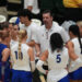 San Jose State head coach Todd Kress, back center, talks to his players during a time out in the first set of an NCAA college volleyball match against Colorado State Thursday, Oct. 3, 2024, in Fort Collins, Colo. (AP Photo/David Zalubowski)