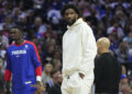 PHILADELPHIA, PENNSYLVANIA - OCTOBER 23: Joel Embiid #21 of the Philadelphia 76ers looks on during a timeout against the Milwaukee Bucks in the first half at the Wells Fargo Center on October 23, 2024 in Philadelphia, Pennsylvania. NOTE TO USER: User expressly acknowledges and agrees that, by downloading and/or using this photograph, user is consenting to the terms and conditions of the Getty Images License Agreement. (Photo by Mitchell Leff/Getty Images)