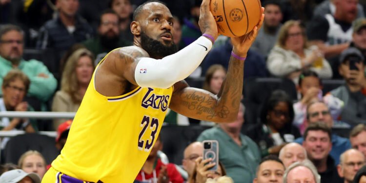 MILWAUKEE, WISCONSIN - OCTOBER 10: LeBron James #23 of the Los Angeles Lakers takes a shot during a preseason game against the Milwaukee Bucks at Fiserv Forum on October 10, 2024 in Milwaukee, Wisconsin.  NOTE TO USER: User expressly acknowledges and agrees that, by downloading and or using this photograph, User is consenting to the terms and conditions of the Getty Images License Agreement. (Photo by Stacy Revere/Getty Images)