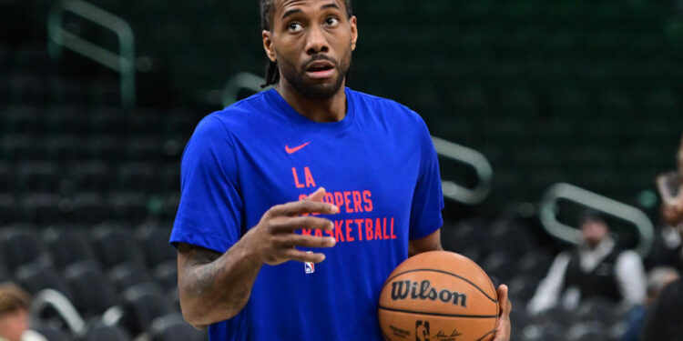 Mar 4, 2024; Milwaukee, Wisconsin, USA; Los Angeles Clippers forward Kawhi Leonard (2) warms up before game against the Milwaukee Bucks at Fiserv Forum. Mandatory Credit: Benny Sieu-USA TODAY Sports