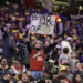 A fan hold up a sign in the stands urging the former Seattle Sonics basketball team to return to Seattle before a preseason NBA basketball game between the Los Angeles Clippers and the Portland Trail Blazers, Friday, Oct. 11, 2024, in Seattle. (AP Photo/John Froschauer)