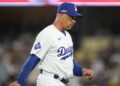 Dave Roberts walks back to the dugout