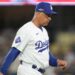 Dave Roberts walks back to the dugout