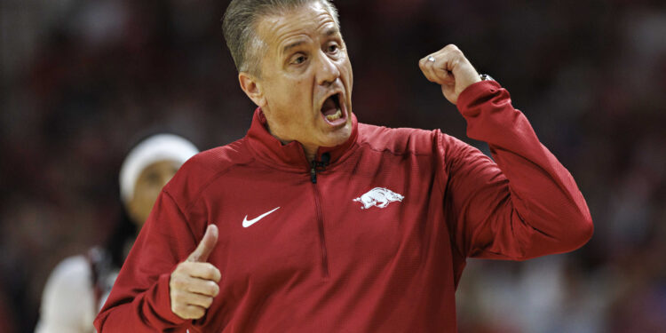 FAYETTEVILLE, ARKANSAS - OCTOBER 25: Head Coach John Calipari of the Arkansas Razorbacks directs his team during a game against the Kansas Jayhawks at Bud Walton Arena on October 25, 2024 in Fayetteville, Arkansas. The Razorbacks defeated the Jayhawks 85-69.  (Photo by Wesley Hitt/Getty Images)