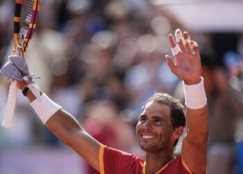 FILE - Rafael Nadal of Spain celebrates his victory over Marton Fucsovics of Hungary during the men's singles tennis competition, at the 2024 Summer Olympics, Sunday, July 28, 2024, in Paris, France, as he has announced he will retire from tennis at age 38 following the Davis Cup finals in November. (AP Photo/Manu Fernandez, File)