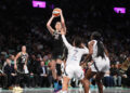 Sep 29, 2024; Brooklyn, New York, USA; New York Liberty forward Breanna Stewart (30) shoots a jump shot over Las Vegas Aces forward Alysha Clark (7) during game one of the 2024 WNBA Semi-finals at Barclays Center. Mandatory Credit: Gregory Fisher-Imagn Images