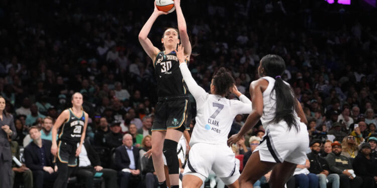 Sep 29, 2024; Brooklyn, New York, USA; New York Liberty forward Breanna Stewart (30) shoots a jump shot over Las Vegas Aces forward Alysha Clark (7) during game one of the 2024 WNBA Semi-finals at Barclays Center. Mandatory Credit: Gregory Fisher-Imagn Images