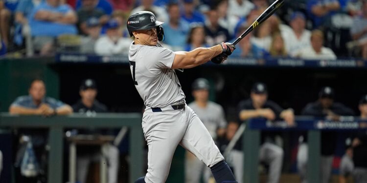 Giancarlo Stanton swings