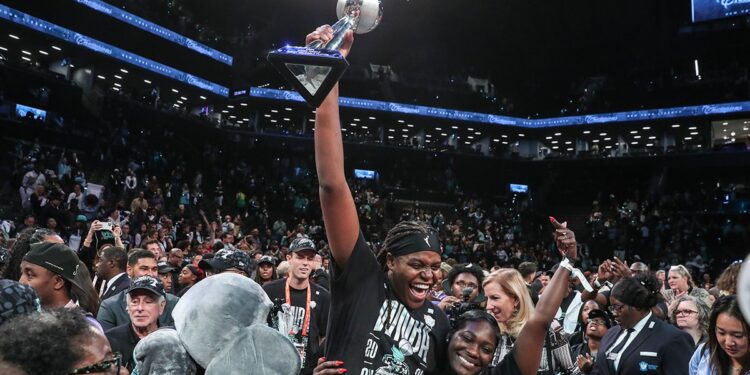 Jonquel Jones lifts WNBA Finals trophy