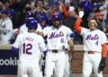 New York Mets shortstop Francisco Lindor celebrates with teammates