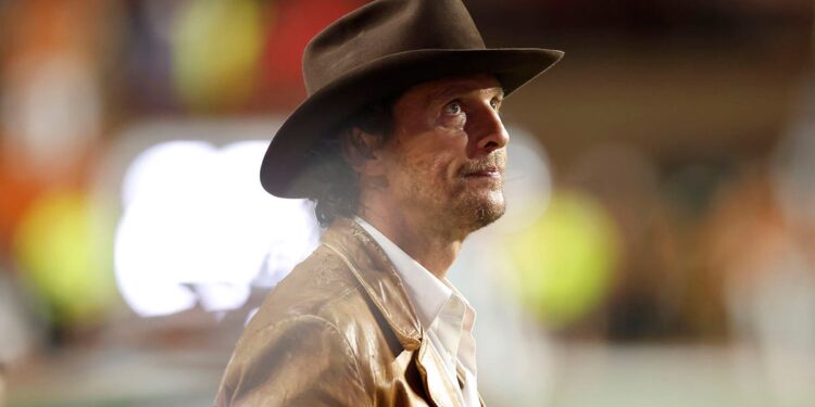 Matthew McConaughey attends a Texas game