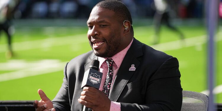 Maurice Jones-Drew talks into microphone