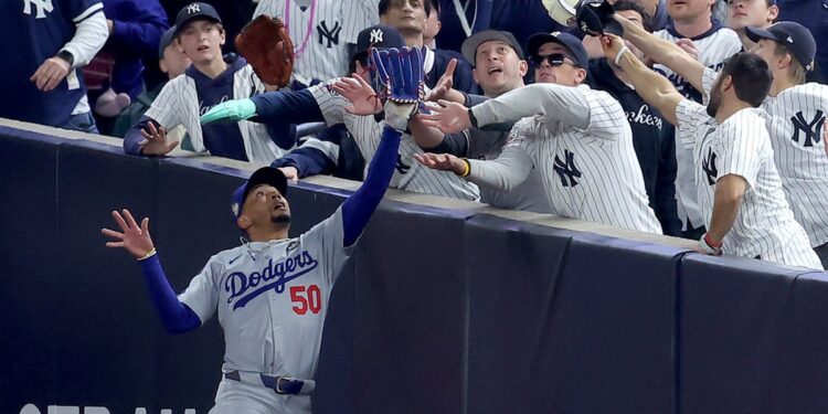 Fans interfere with Mookie Betts