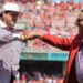 Pete Rose shares fist bump with Tony Perez