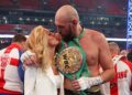 Tyson and Paris Fury kiss in boxing ring