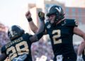 Vanderbilt football players celebrate a touchdown