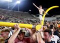 Vanderbilt fan on goal post