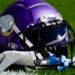 Vikings helmet with gloves on field