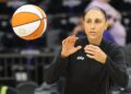 Diana Taurasi catches the basketball