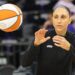 Diana Taurasi catches the basketball