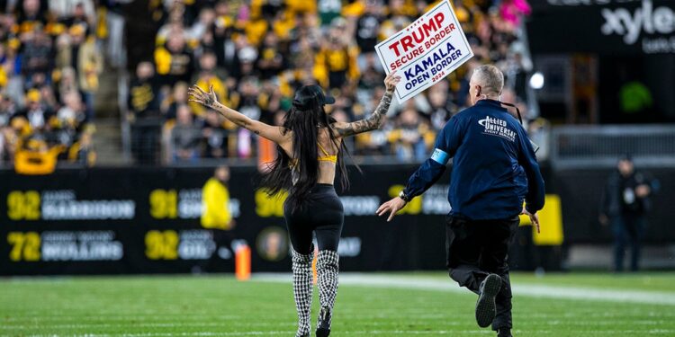 Woman with trump sign