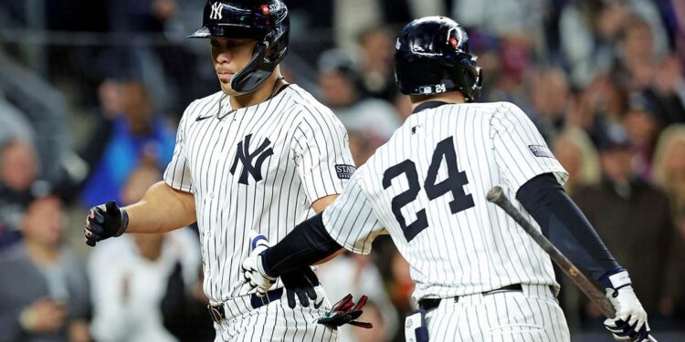 Yankees celebrate run scored