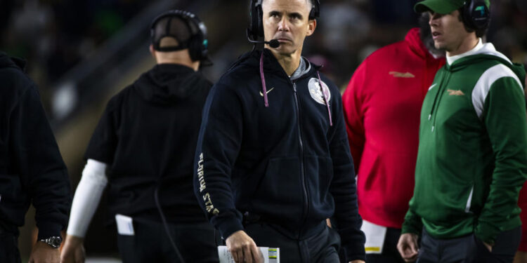 Florida State head coach Mike Norvell looks at the scoreboard during the second half of an NCAA college football game Saturday, Nov. 9, 2024, in South Bend, Ind. (AP Photo/Michael Caterina)