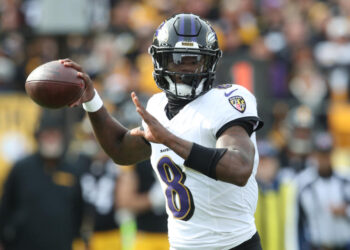 Nov 17, 2024; Pittsburgh, Pennsylvania, USA;  Baltimore Ravens quarterback Lamar Jackson (8) passes against the Pittsburgh Steelers during the first quarter at Acrisure Stadium. Mandatory Credit: Charles LeClaire-Imagn Images