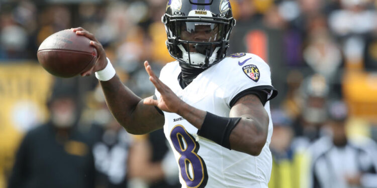 Nov 17, 2024; Pittsburgh, Pennsylvania, USA;  Baltimore Ravens quarterback Lamar Jackson (8) passes against the Pittsburgh Steelers during the first quarter at Acrisure Stadium. Mandatory Credit: Charles LeClaire-Imagn Images