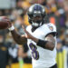 Nov 17, 2024; Pittsburgh, Pennsylvania, USA;  Baltimore Ravens quarterback Lamar Jackson (8) passes against the Pittsburgh Steelers during the first quarter at Acrisure Stadium. Mandatory Credit: Charles LeClaire-Imagn Images