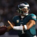 ARLINGTON, TEXAS - NOVEMBER 10: Jalen Hurts #1 of the Philadelphia Eagles throws on the sidelines during the first half against the Dallas Cowboys at AT&T Stadium on November 10, 2024 in Arlington, Texas. (Photo by Sam Hodde/Getty Images)