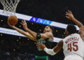 BOSTON, MASSACHUSETTS - NOVEMBER 19: Jayson Tatum #0 of the Boston Celtics shoots against Donovan Mitchell #45 of the Cleveland Cavaliers during the first quarter of the Emirates NBA Cup at TD Garden on November 19, 2024 in Boston, Massachusetts. NOTE TO USER: User expressly acknowledges and agrees that, by downloading and or using this photograph, User is consenting to the terms and conditions of the Getty Images License Agreement.  (Photo by Winslow Townson/Getty Images)