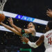 BOSTON, MASSACHUSETTS - NOVEMBER 19: Jayson Tatum #0 of the Boston Celtics shoots against Donovan Mitchell #45 of the Cleveland Cavaliers during the first quarter of the Emirates NBA Cup at TD Garden on November 19, 2024 in Boston, Massachusetts. NOTE TO USER: User expressly acknowledges and agrees that, by downloading and or using this photograph, User is consenting to the terms and conditions of the Getty Images License Agreement.  (Photo by Winslow Townson/Getty Images)