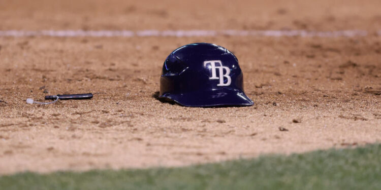 OAKLAND, CALIFORNIA - AUGUST 20: A batting helmet of a Tampa Bay Rays player sits on the field during the game against the Oakland Athletics at Oakland Coliseum on August 20, 2024 in Oakland, California. (Photo by Lachlan Cunningham/Getty Images)