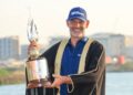 Paul Waring holds the Abu Dhabi HSBC Championship trophy