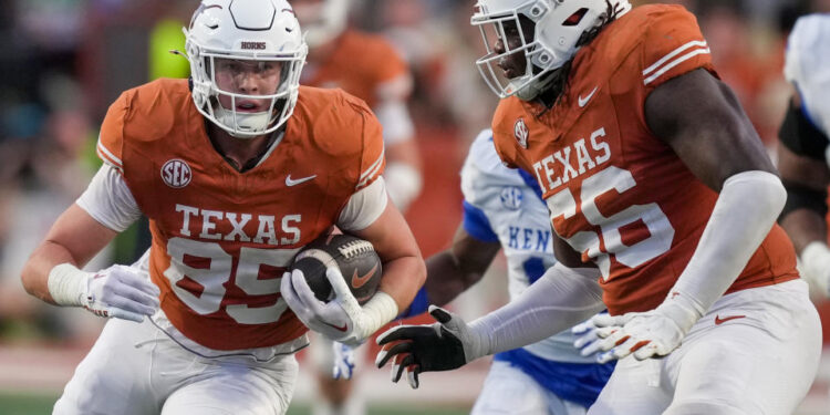 Nov 23, 2024; Austin, Texas, USA; Texas Longhorns tight end Gunnar Helm (85) runs the ball against the Kentucky Wildcats in the fourth quarter at Darrell K Royal Texas Memorial Stadium. Mandatory Credit: Ricardo B. Brazziell/USA TODAY Network via Imagn Images