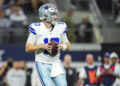 ARLINGTON, TX - NOVEMBER 10: Cooper Rush #10 of the Dallas Cowboys drops back to pass during an NFL football game against the Philadelphia Eagles at AT&T Stadium on November 10, 2024 in Arlington, Texas. (Photo by Cooper Neill/Getty Images)