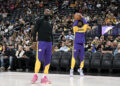 Oct 15, 2024; Las Vegas, Nevada, USA; Los Angeles Lakers forward LeBron James (23) warms up with guard Bronny James (9) before the preseason game against the Golden State Warriors at T-Mobile Arena. Mandatory Credit: Candice Ward-Imagn Images