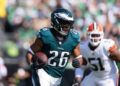 Oct 13, 2024; Philadelphia, Pennsylvania, USA; Philadelphia Eagles running back Saquon Barkley (26) runs with the ball against the Cleveland Browns during the first quarter at Lincoln Financial Field. Mandatory Credit: Bill Streicher-Imagn Images