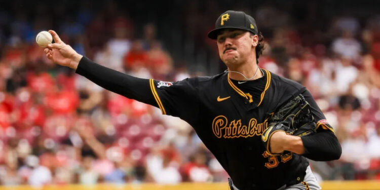 Sep 22, 2024; Cincinnati, Ohio, USA; Pittsburgh Pirates starting pitcher Paul Skenes (30) pitches against the Cincinnati Reds in the third inning at Great American Ball Park. Mandatory Credit: Katie Stratman-Imagn Images