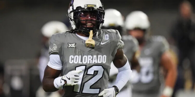 Oct 26, 2024; Boulder, Colorado, USA; Colorado Buffaloes wide receiver Travis Hunter (12) reacts after touchdown reception in the first quarter against the Cincinnati Bearcats at Folsom Field. Mandatory Credit: Ron Chenoy-Imagn Images