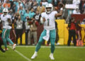 Dec 3, 2023; Landover, Maryland, USA; Miami Dolphins quarterback Tua Tagovailoa (1) drops back to pass against the Washington Commanders during the first half at FedExField. credits: Brad Mills-USA TODAY Sports