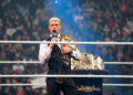 COLUMBIA, SOUTH CAROLINA - OCTOBER 18: Cody Rhodes speaks to the WWE Universe with the Undisputed WWE Championship belt over his shoulder during SmackDown at Colonial Life Arena on October 18, 2024 in Columbia, South Carolina.  (Photo by WWE/Getty Images)