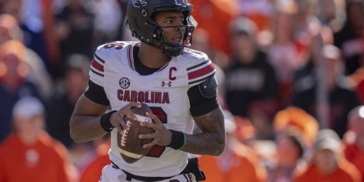 South Carolina quarterback LaNorris Sellers (16) drops back to pass in the first half of an NCAA college football game against Clemson, Saturday, Nov. 30, 2024, in Clemson, S.C. (AP Photo/Jacob Kupferman)